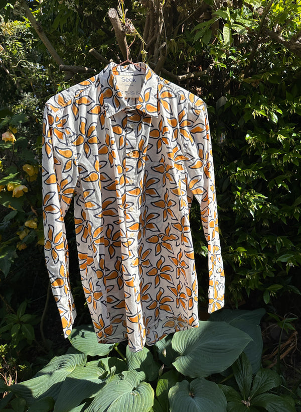 Seek Bazaar | Unisex Page Shirt, offerings print